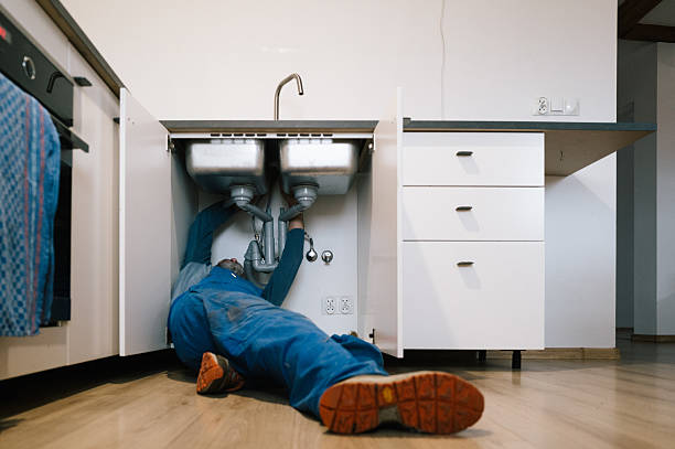 Professional Drain Cleaning technician working in Penney Farms, FL